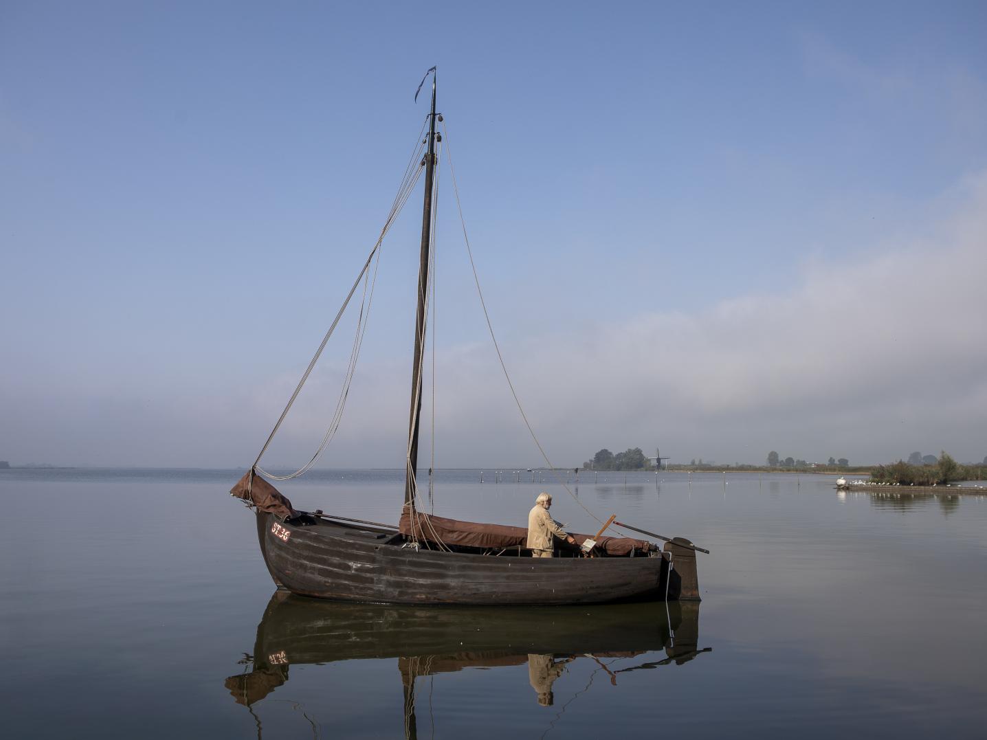 Sailboat with one person on it
